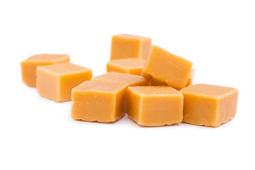 Tasty toffees on a white background.