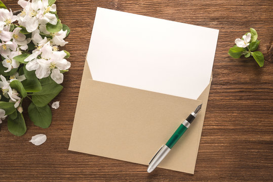 Flowers, envelope and pen
