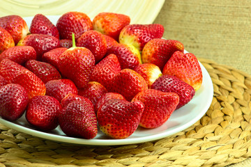 Fresh Strawberry on a Wooden Rustic Dish