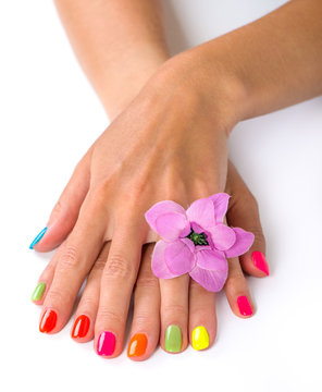 Woman hands with bright manicure