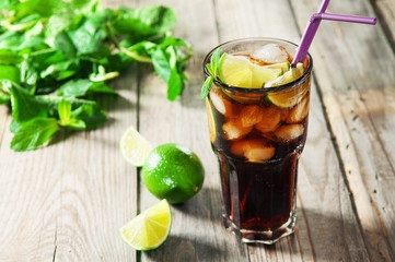 Cocktail with cola and ice