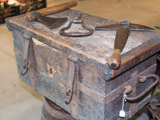 old rural rusty tools above antique wooden box