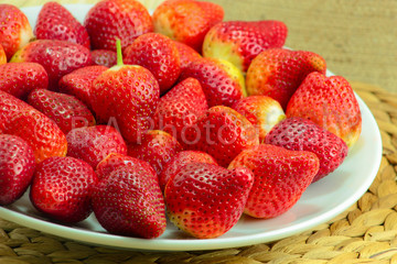 Fresh Strawberry on a Wooden Rustic Dish