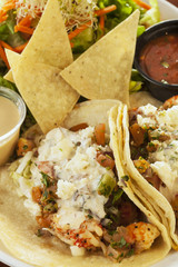 langostino tacos, also referred to as shrimp tacos