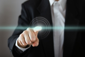 Businessman's hand pressing the virtual screen. Business, techno