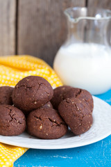 Italian chocolate cookies with walnuts and a cup of coffee