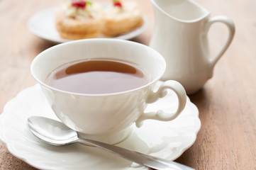 A cup of whole leaf lapsang souchong tea, a rich smoky flavored