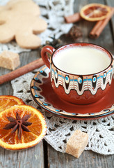 Hot cocoa in a old ceramic cup on a wooden table
