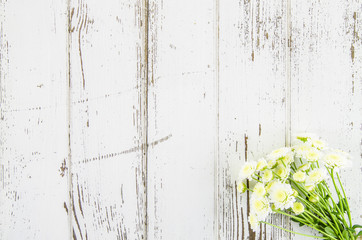 Empty wooden background with flowers