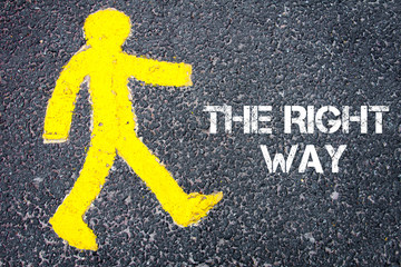 Yellow pedestrian figure walking towards THE RIGHT WAY