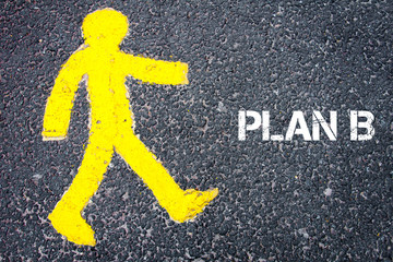 Yellow pedestrian figure walking towards PLAN B