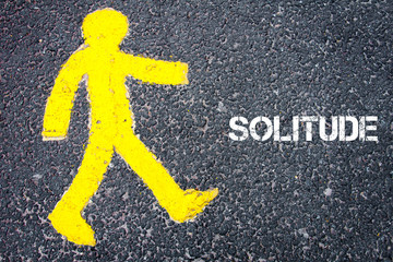 Yellow pedestrian figure walking towards SOLITUDE