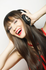 Young happy woman with headphones