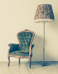 Fototapeta premium Vintage and antique chair with white wall background