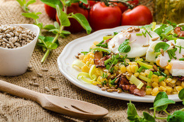 Spring salad of lentils with poached egg