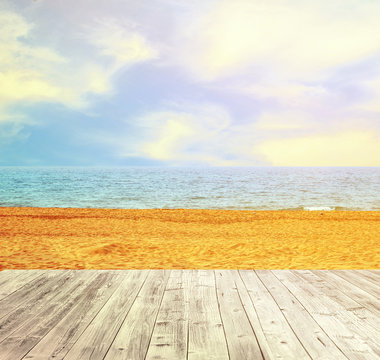 Sandy beach and seascape with wooden floor