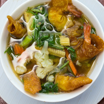 Thai soup with shrimp and vegetables
