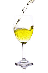yellow water in wine glass. isolated on a white background