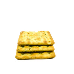 Vegetable salty crackers on white background.
