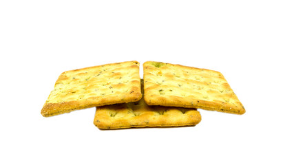 Vegetable salty crackers on white background.