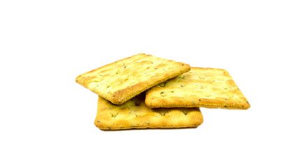 Vegetable salty crackers on white background.