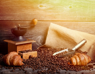 Coffee background with items and fresh croissant