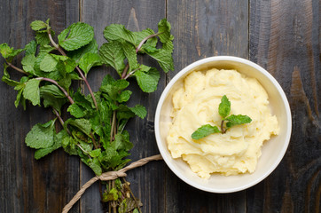 Mashed potato on wooden background
