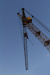 Naklejka premium building crane against the sky