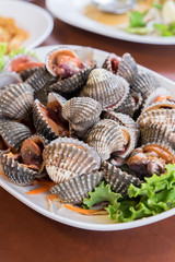 Grilled cockle in Thai seafood style.