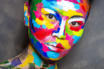 Obraz premium Emotions of asian woman with face art