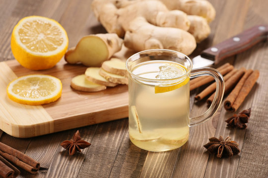 ginger tea in a cup of glass, ginger, lemon, cinnamon, star anis