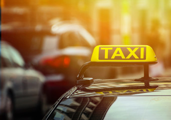 Taxi sign on car