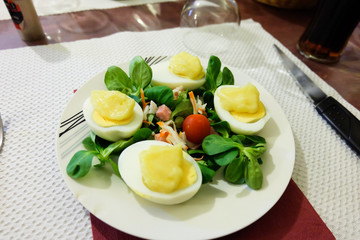  stuffed eggs with mayonnaise in plate