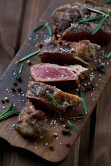 Close-up of sliced medium rare grilled beef steak ribeye