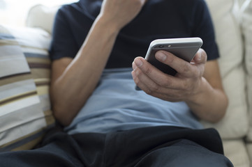 Men are using the latest smartphone