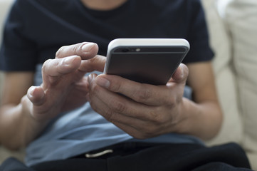 Men are using the latest mobile phone