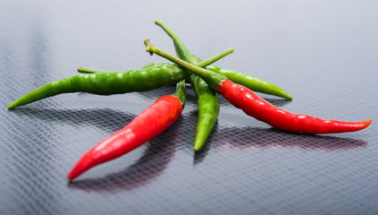 chili pepper on a black texture