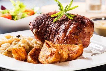 Pork knuckle with fried sauerkraut