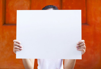 Girl holding white board