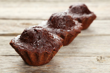 Chocolate cupcake on grey wooden background