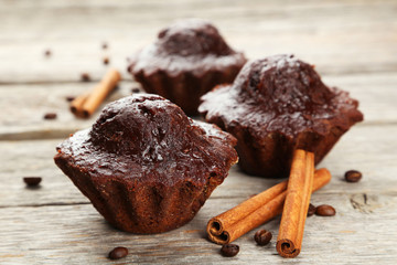 Chocolate cupcake on grey wooden background