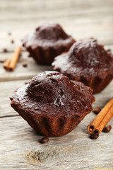 Chocolate cupcake on grey wooden background