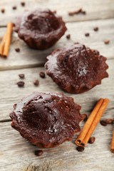 Chocolate cupcake on grey wooden background