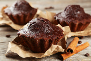 Chocolate cupcake on grey wooden background