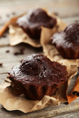 Chocolate cupcake on grey wooden background