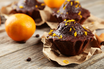 Chocolate cupcake on grey wooden background