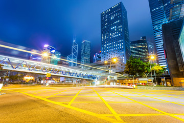 Traffic light trails in illuminated city
