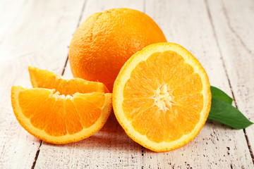 Orange fruit on white wooden background