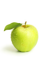 Green apple with leaf isolated on white