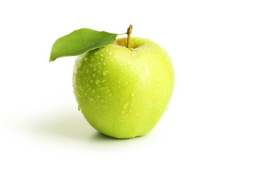 Green apple with leaf isolated on white